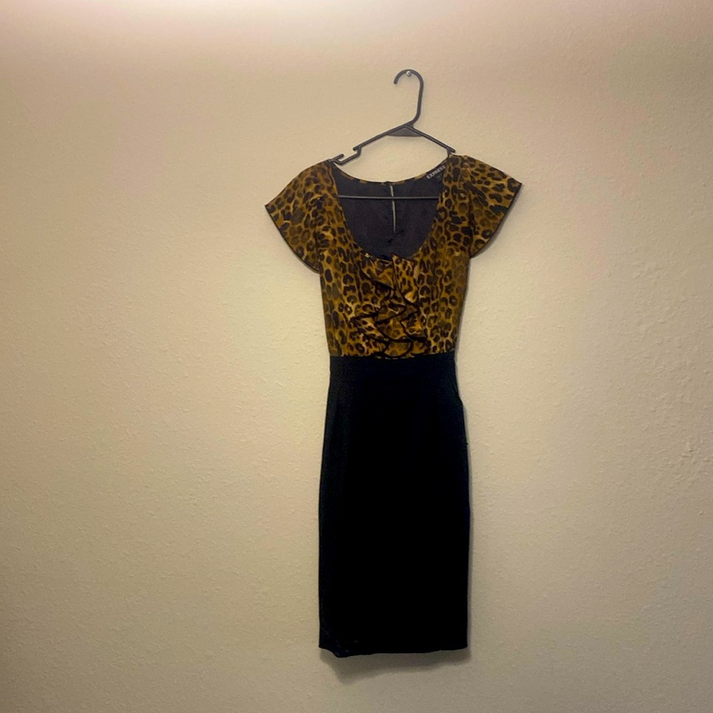 Cheetah print business dress with black pencil skirt and pockets